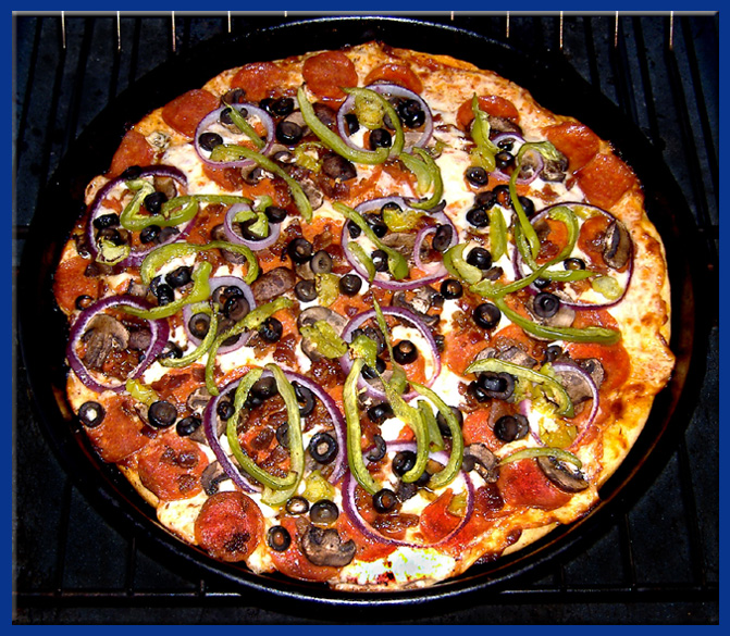 Pizza Cooked, Peppers, Onions, Peperroni, Black Olives